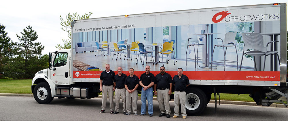 Instillation services hero image - truck with employees