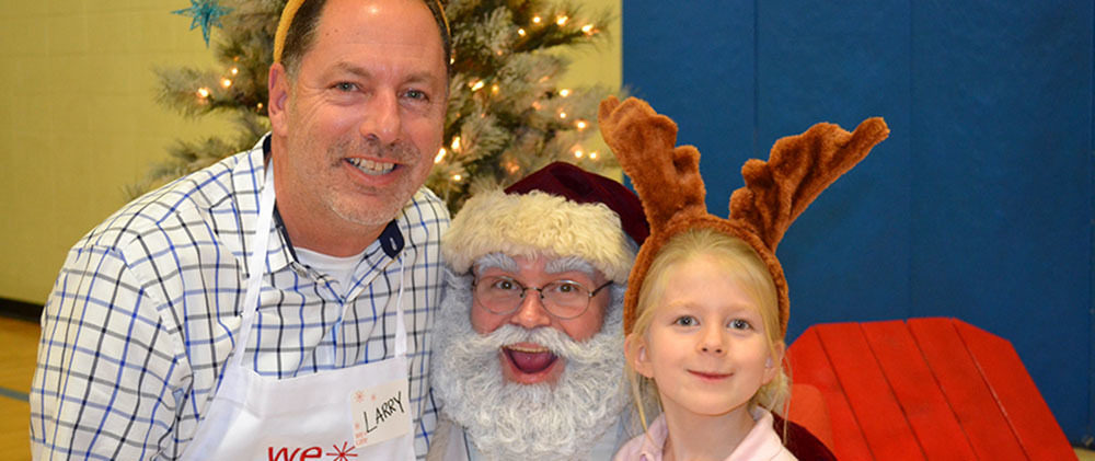 WeCare event 2018: posing with Santa