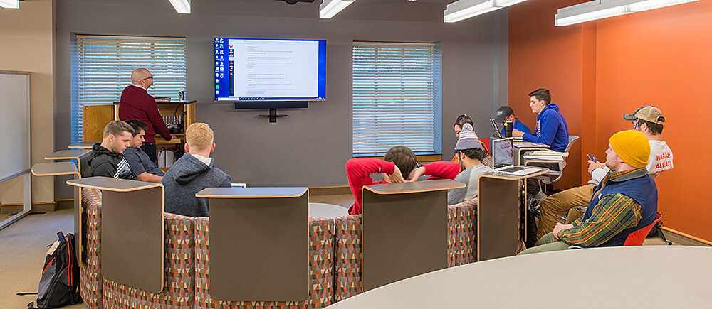 Wabash Project Highlight: horseshoe seating lecture space with students and teacher
