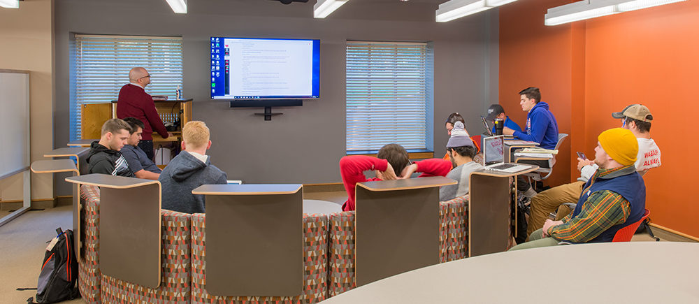 Wabash Project Highlight: horseshoe seating lecture space with students and teacher