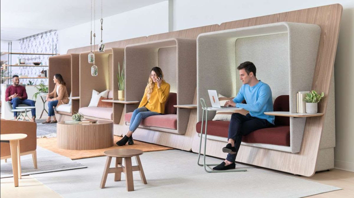 Staged image of people working in LeanTo workspaces