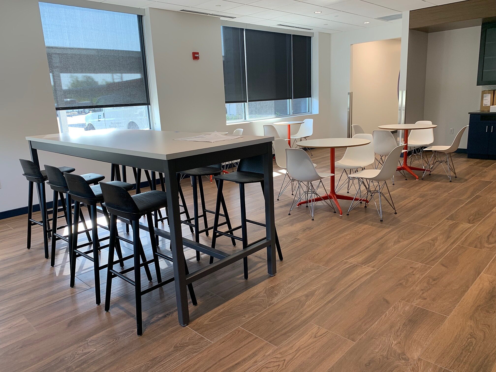 Bar height and traditional height tables and chairs in the Goodman Campbell Brain and Spine center