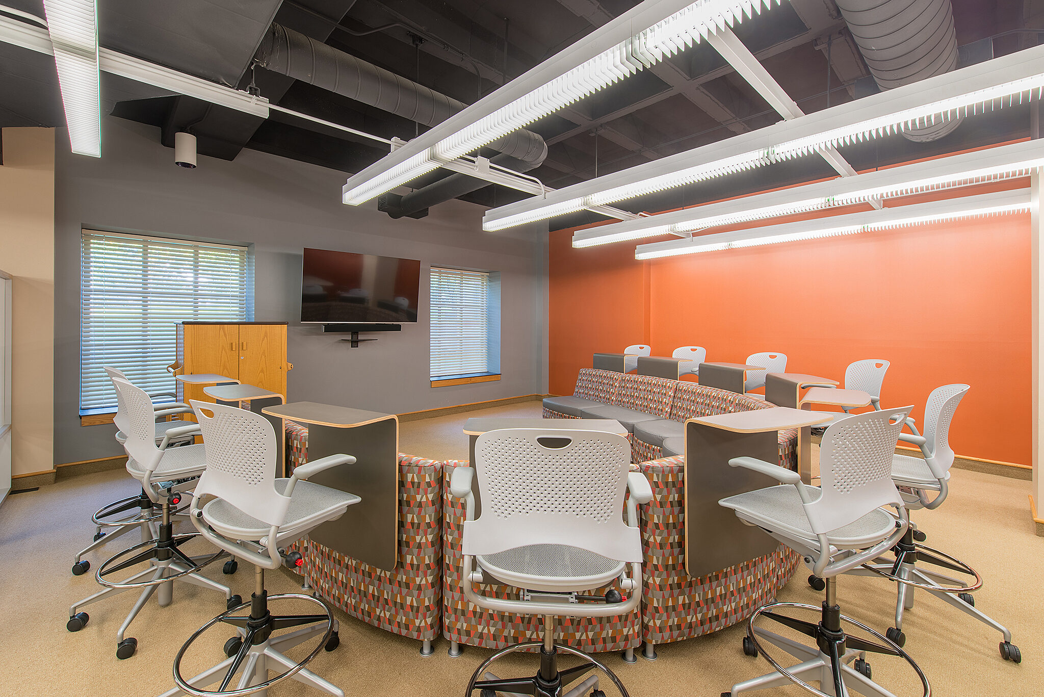 Wabash Project Highlight: Horseshoe discussion seating space back view