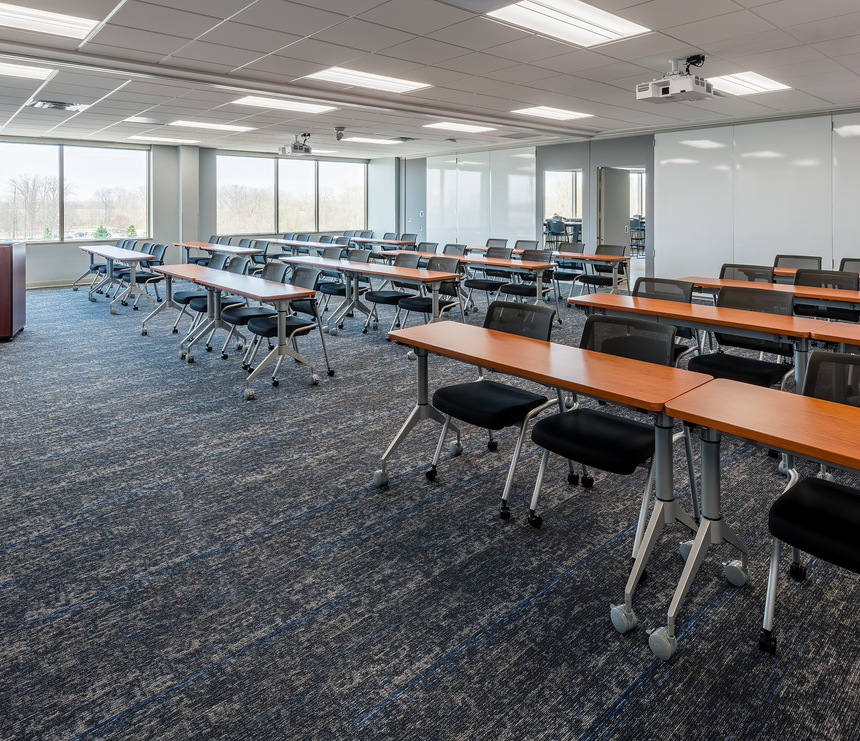 Orbis education room with desks and chairs