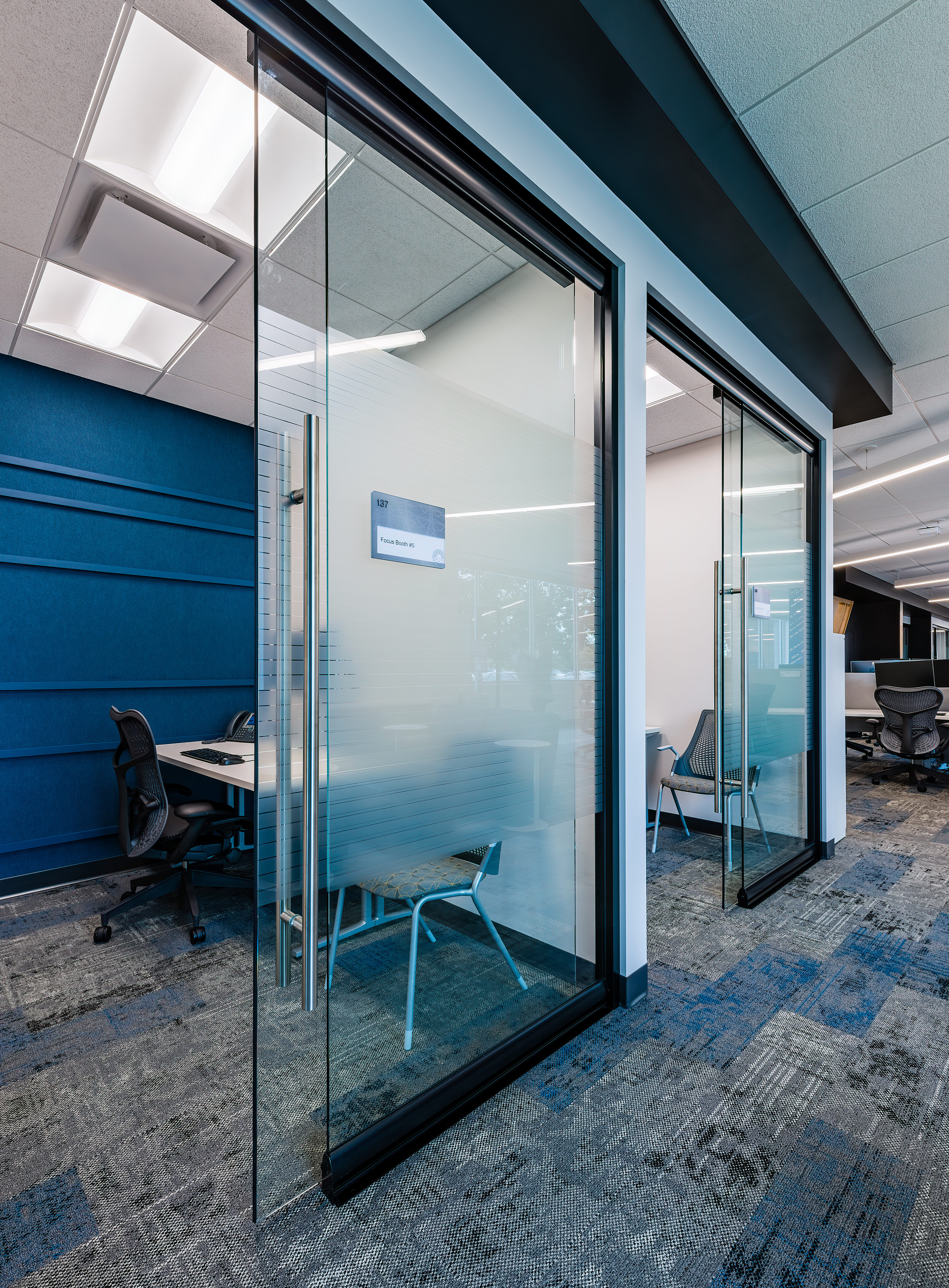 Private work areas in an energy company by OfficeWorks.