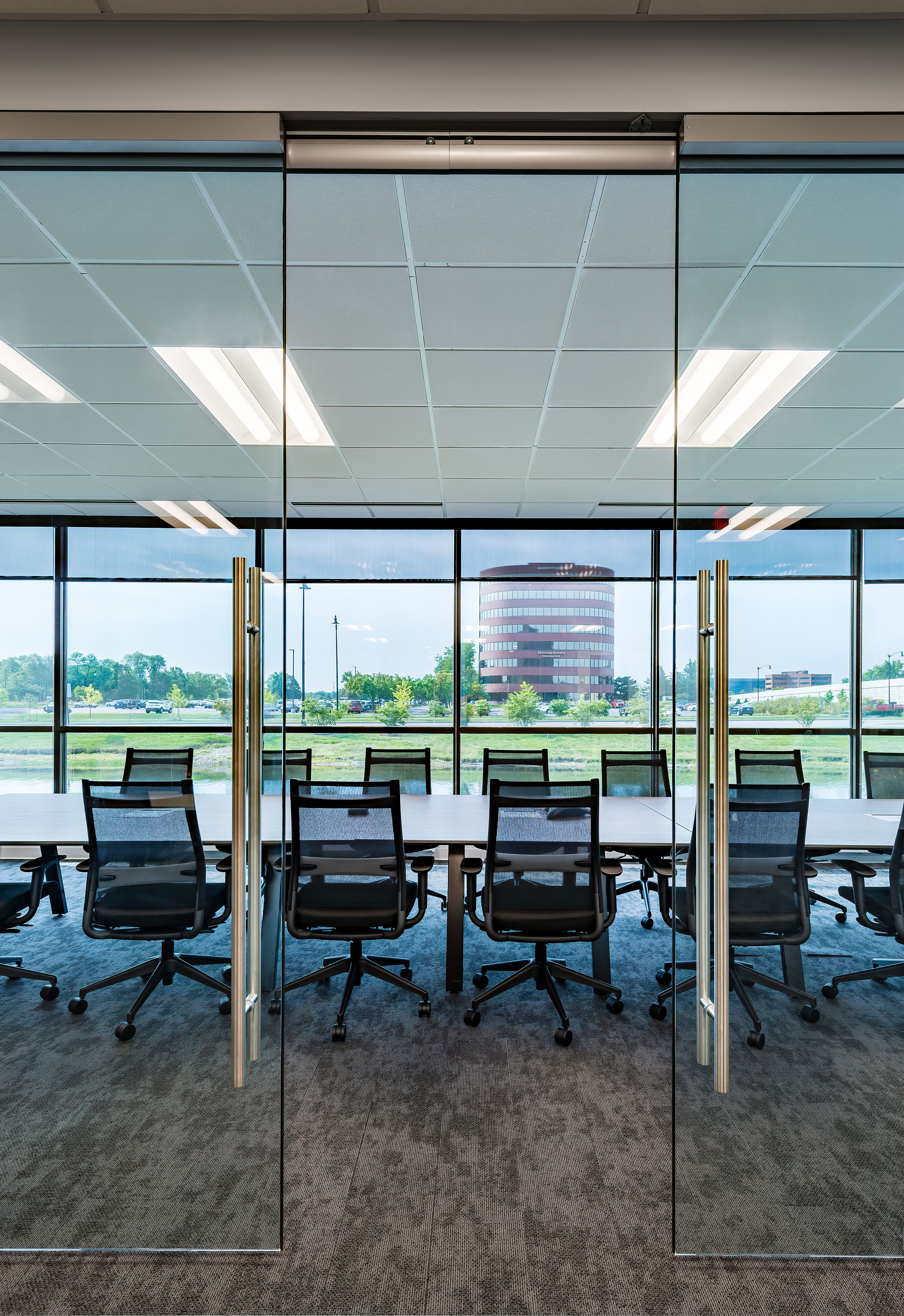 Travel Agent office renovation, glass wall conference room