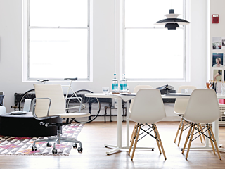 Design within reach white chairs and white table home setting