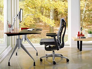Embody chair at desk showing fall setting outdoors