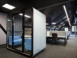 Framery two person pod blue couches in office
