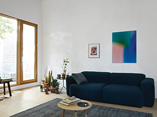 HAY black sofa home setting