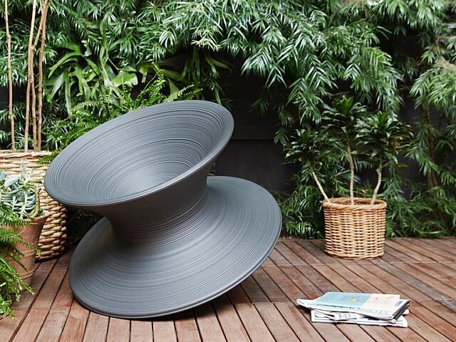 Magis black spinning chair outdoors