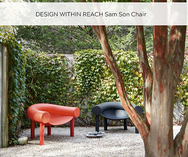 OfficeWorks Sam Son Chair Outdoors - orange and black in yard